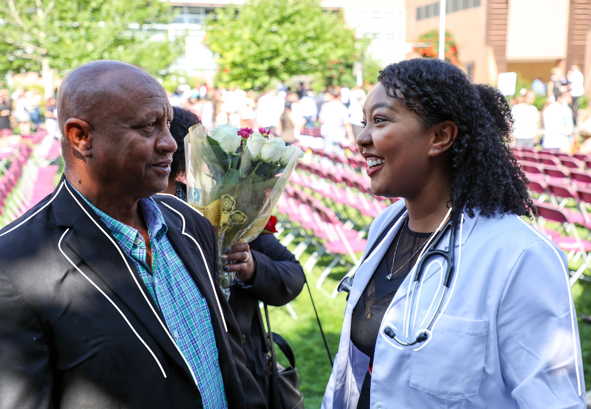 Alla Yousif and her father at the White Coat Ceremony at CU Anschutz (Photo by Andrew Vessely)